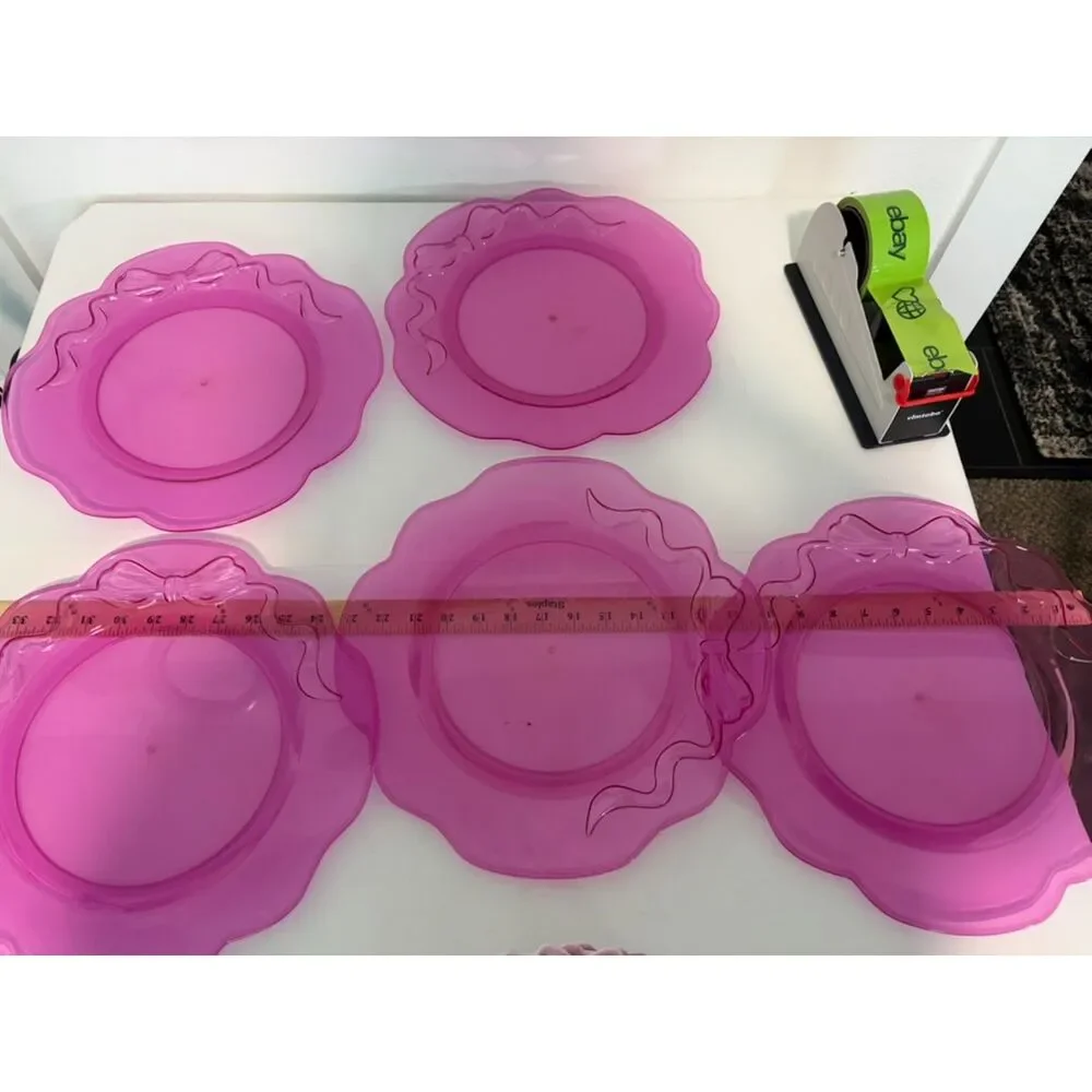 5 pink plastic with bow platters